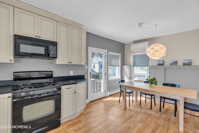 kitchen featuring an AC wall unit, dark countertops, black appliances, and cream cabinets