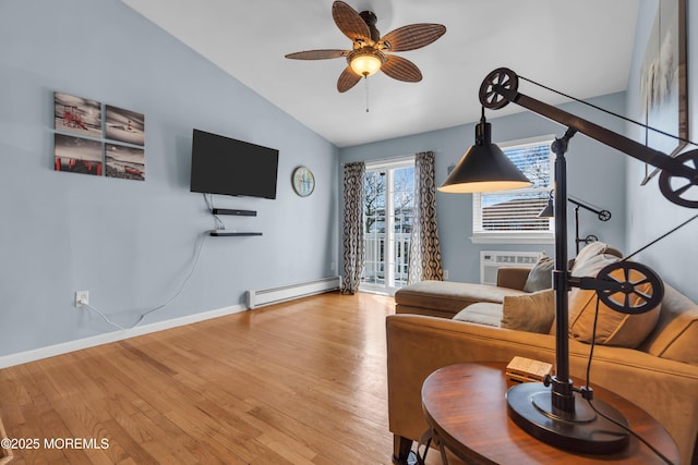 living room with ceiling fan, baseboards, lofted ceiling, light wood-style floors, and a baseboard radiator