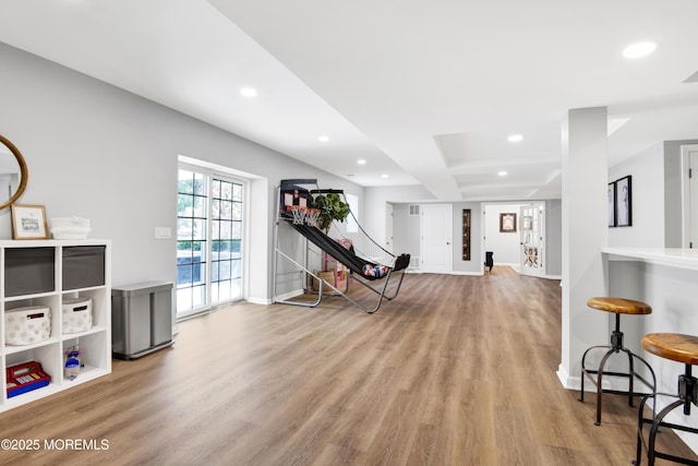 playroom with recessed lighting, baseboards, and wood finished floors