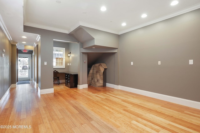 unfurnished living room featuring recessed lighting, baseboards, ornamental molding, and light wood finished floors