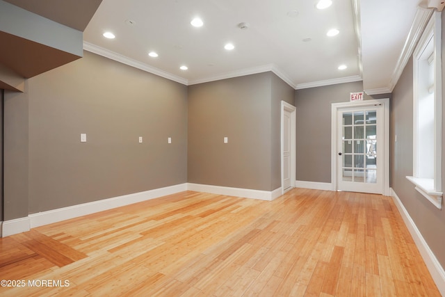 unfurnished room with recessed lighting, baseboards, ornamental molding, and light wood-style floors