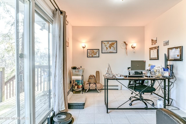 office with tile patterned floors and baseboard heating