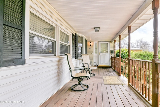 wooden deck featuring covered porch