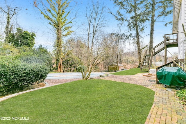 view of yard featuring stairs