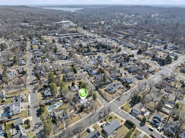 birds eye view of property with a residential view