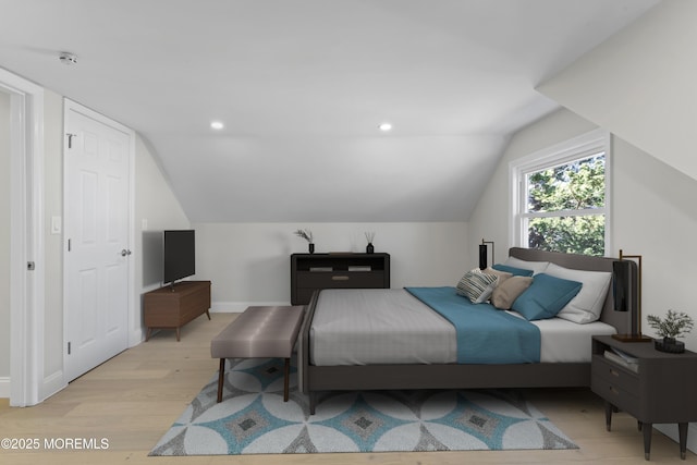 bedroom featuring lofted ceiling, recessed lighting, light wood-style floors, and baseboards