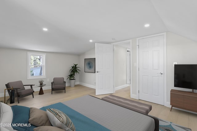 bedroom featuring recessed lighting, light wood-style flooring, baseboards, and vaulted ceiling