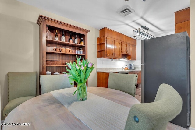 dining area with visible vents