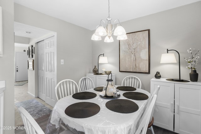 dining area with a notable chandelier