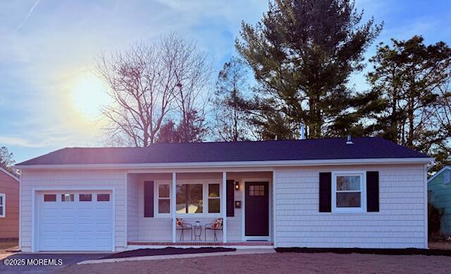 ranch-style house featuring an attached garage