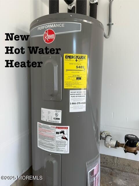 utility room with water heater