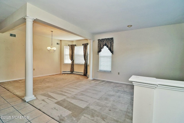 interior space with visible vents, light carpet, baseboards, baseboard heating, and ornate columns