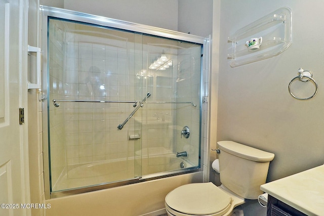 full bath with vanity, toilet, and enclosed tub / shower combo