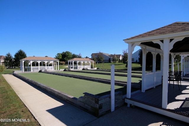 view of home's community with a gazebo and a yard