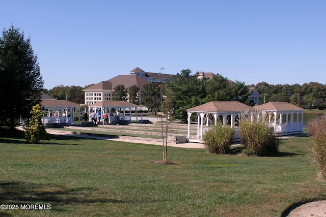 exterior space with a gazebo and a yard
