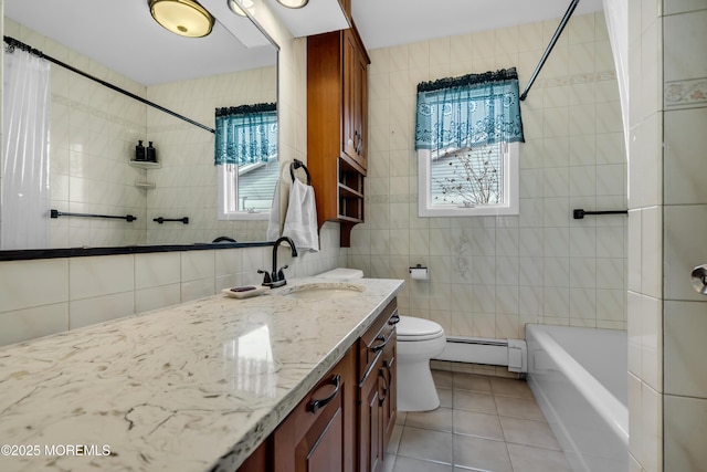 full bath featuring a baseboard radiator, toilet, tile walls, and tile patterned flooring