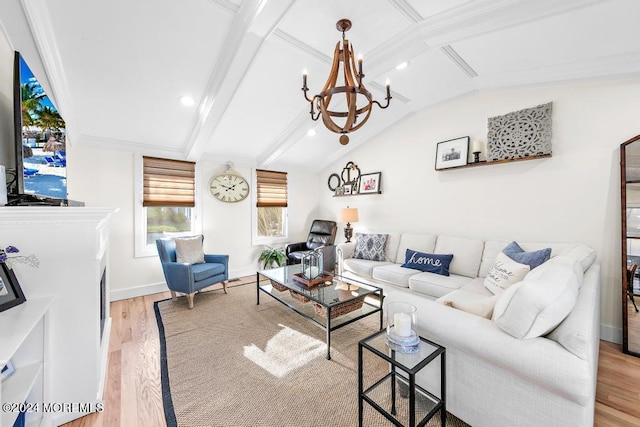 living room with an inviting chandelier, vaulted ceiling with beams, wood finished floors, and baseboards