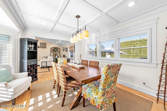 dining area featuring baseboards, light wood finished floors, coffered ceiling, recessed lighting, and crown molding