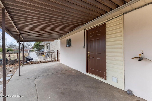 view of patio featuring fence