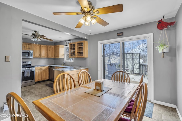 dining room with baseboards