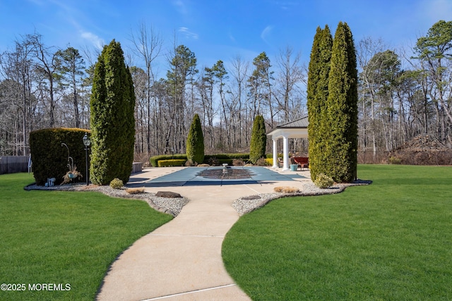 view of yard with a gazebo and a patio