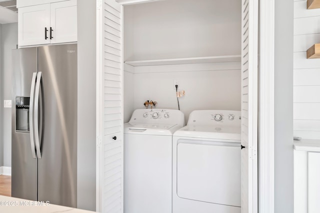 laundry area featuring laundry area and separate washer and dryer