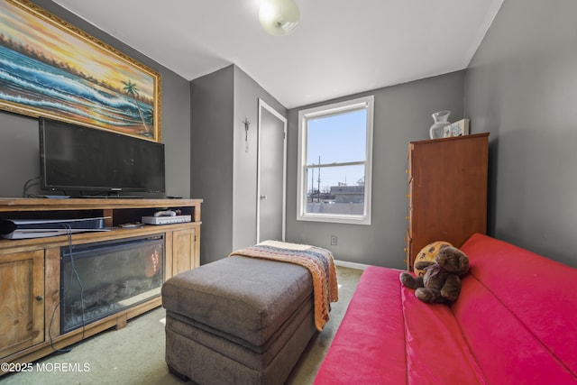 carpeted bedroom with baseboards