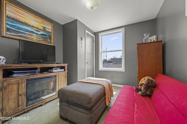 bedroom with carpet and baseboards