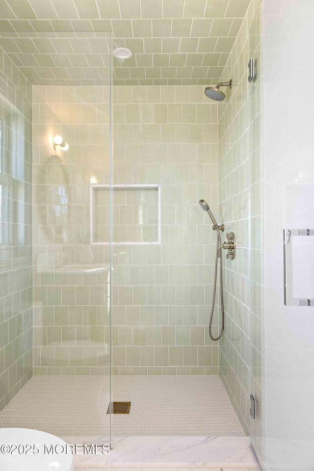 bathroom featuring a stall shower