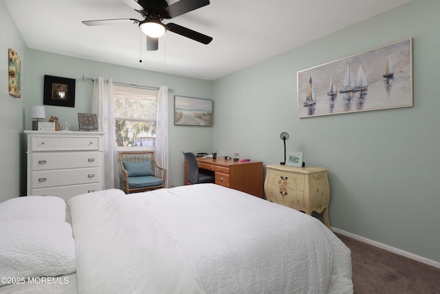 carpeted bedroom featuring ceiling fan and baseboards