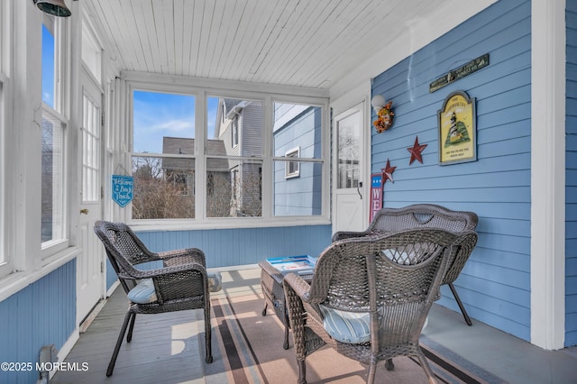 sunroom with wooden ceiling