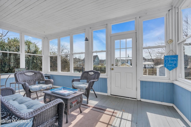 sunroom with plenty of natural light