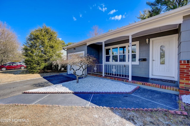 entrance to property with a porch