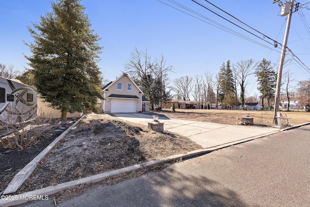 view of front of home with a garage and driveway