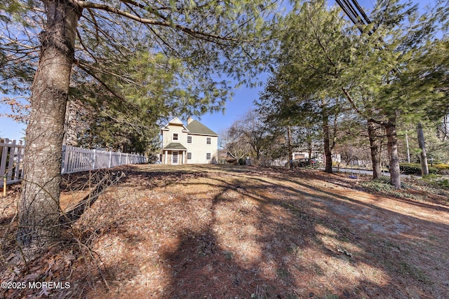 view of yard with fence