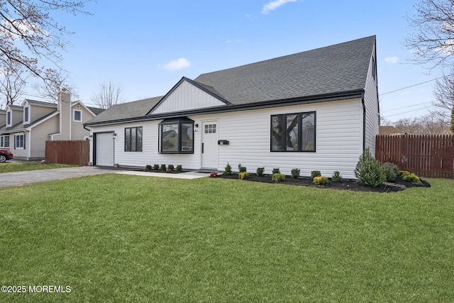 view of front of house featuring fence, concrete driveway, a front yard, a shingled roof, and a garage