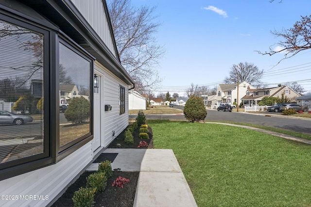 view of yard featuring a residential view