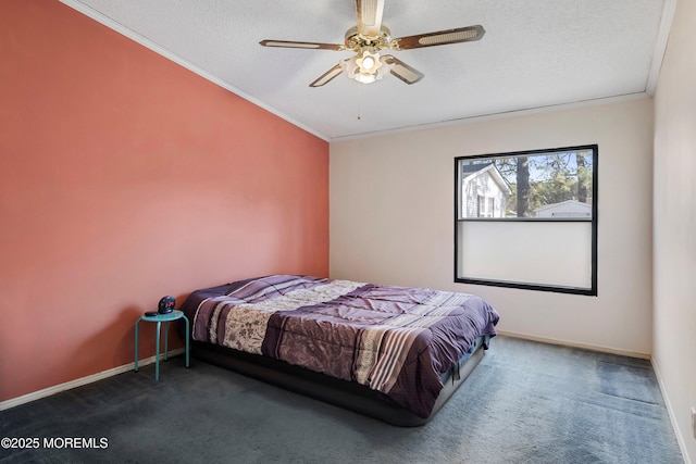 bedroom featuring a textured ceiling, crown molding, and carpet floors