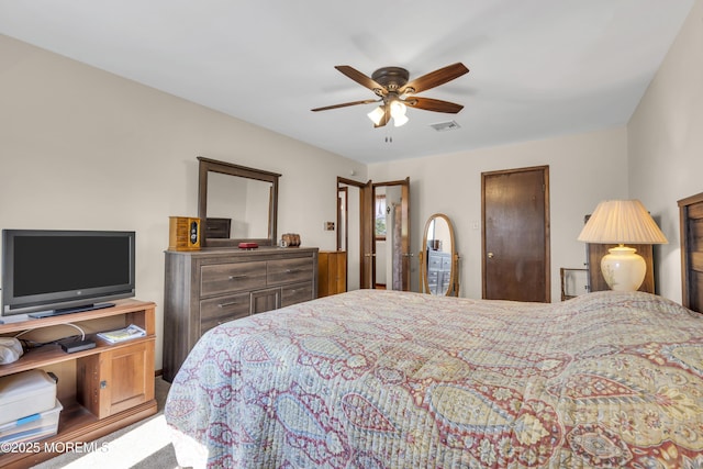 bedroom featuring a ceiling fan and visible vents