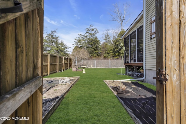 view of yard featuring a fenced backyard