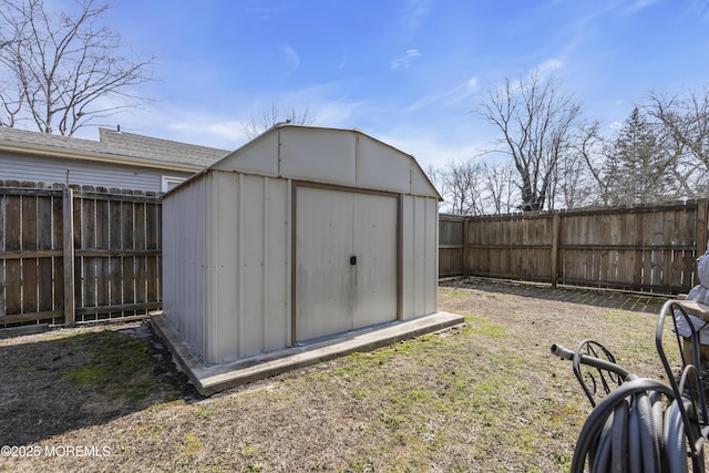 view of shed featuring a fenced backyard