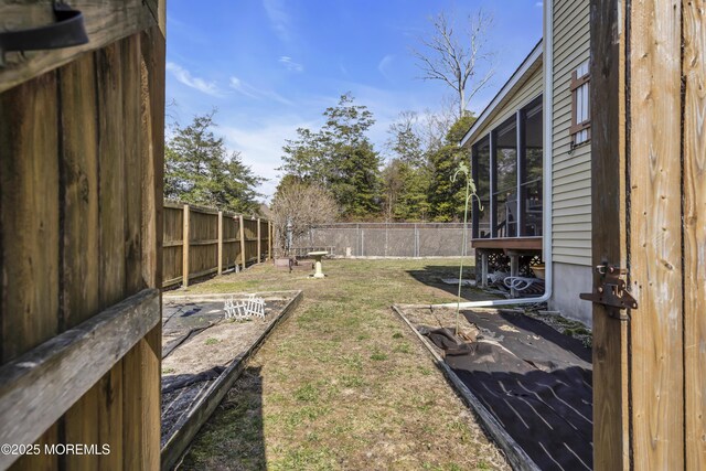 view of yard featuring a fenced backyard