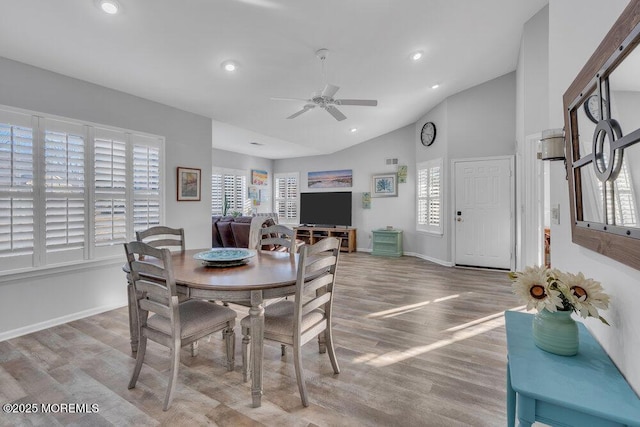 dining space with plenty of natural light, recessed lighting, baseboards, and wood finished floors