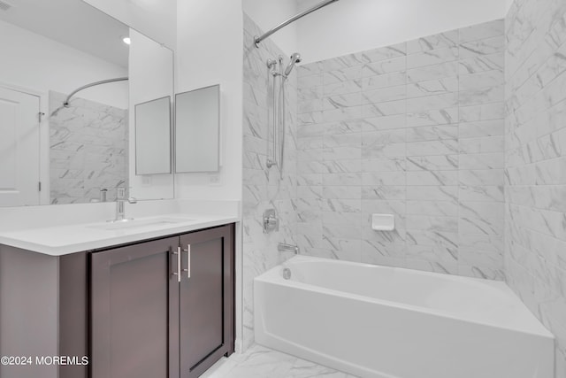 bathroom featuring visible vents, marble finish floor, bathtub / shower combination, and vanity