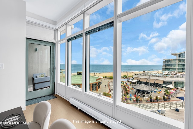 sunroom with a water view