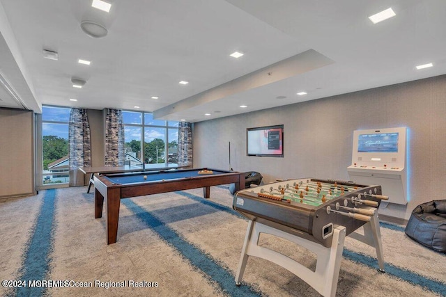 recreation room featuring floor to ceiling windows, pool table, and carpet floors