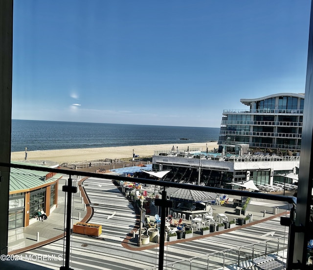 property view of water featuring a beach view