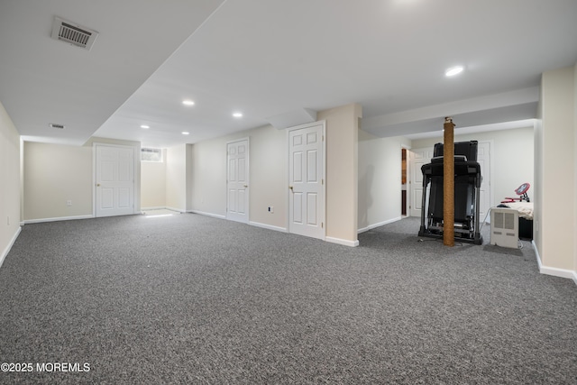 finished basement featuring recessed lighting, carpet flooring, baseboards, and visible vents