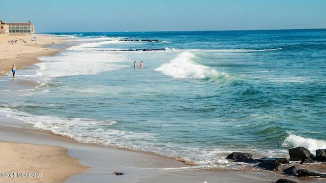 view of water feature featuring a view of the beach