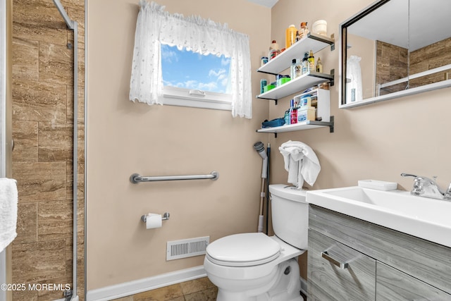 full bath with visible vents, toilet, a tile shower, tile patterned flooring, and baseboards